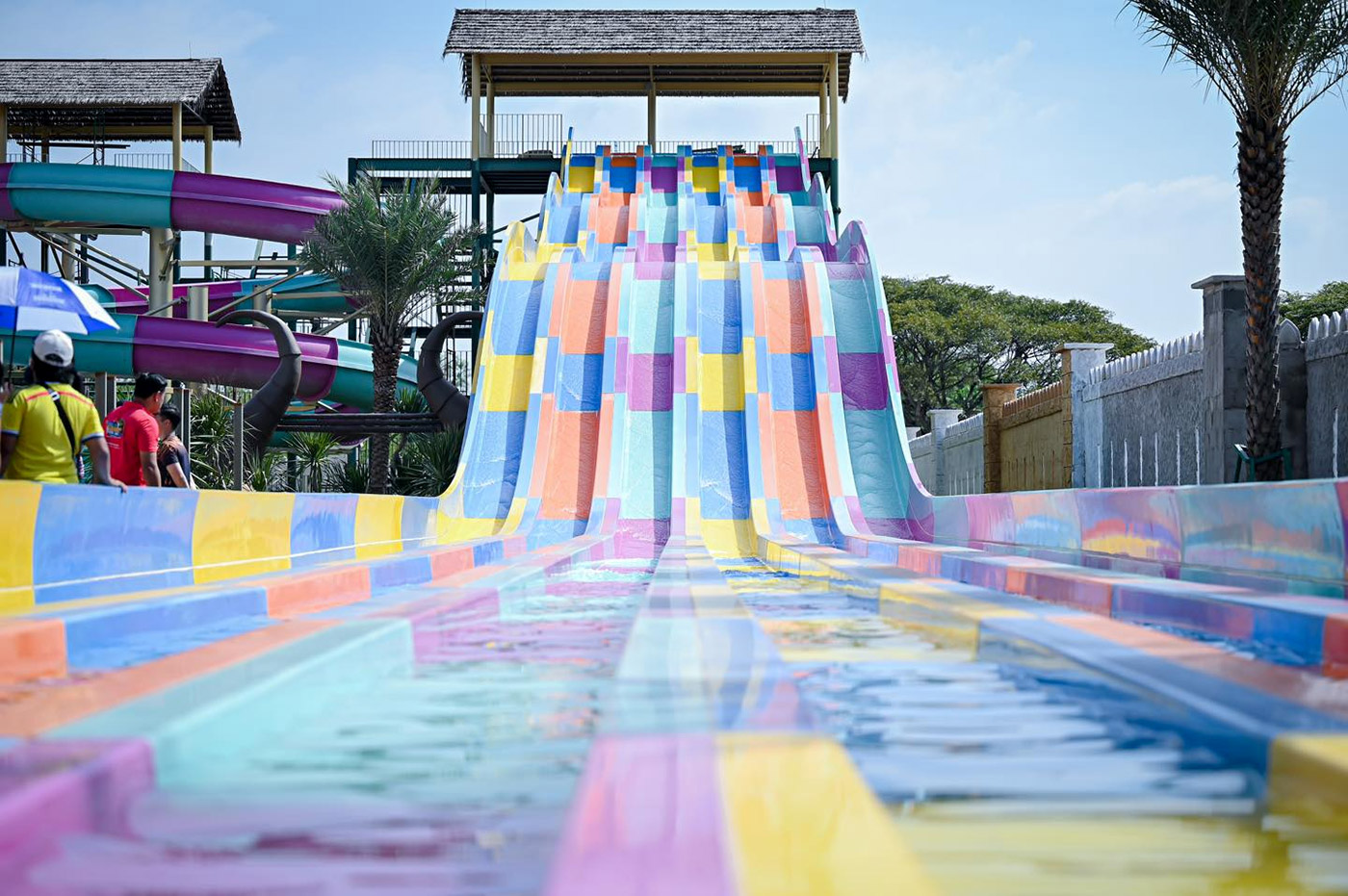 Aerial view of Bertam Resort Water Park in Penang, Malaysia, with slides, wave pool, and lazy river