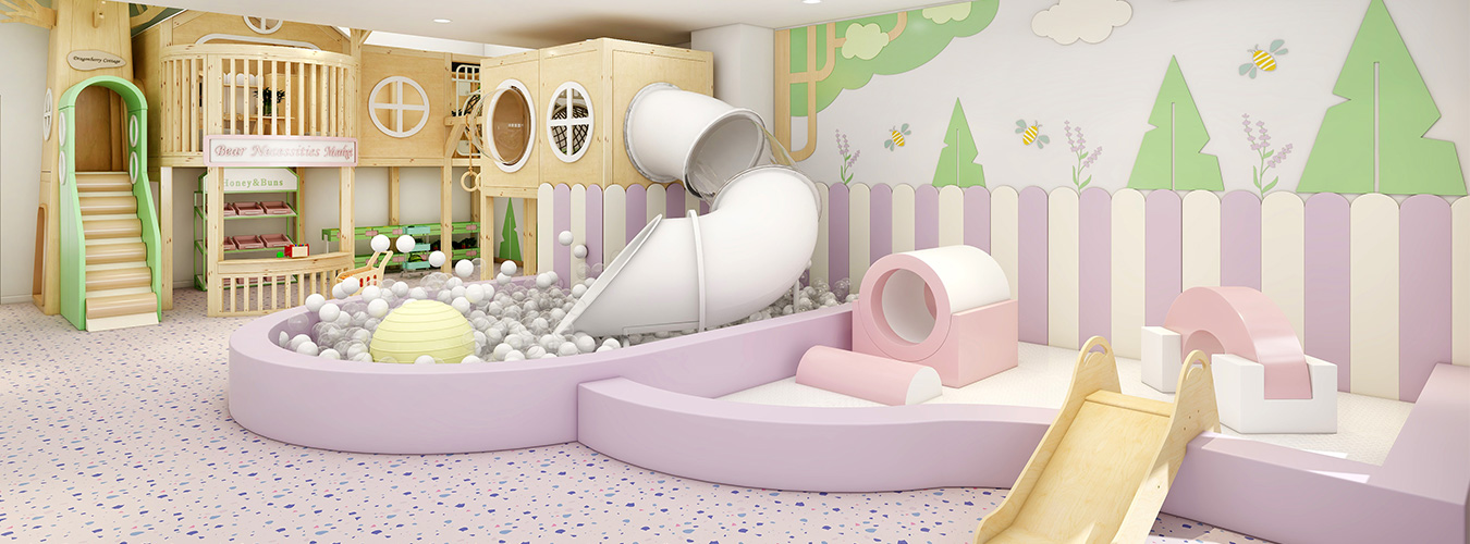 Pastel play cafe interior with a ball pit, white tube slide, and wooden seating